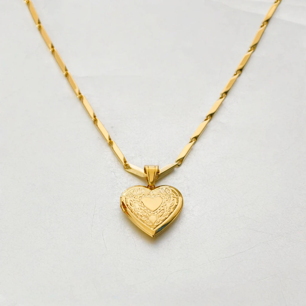 Heart locket and chain detail macro shot