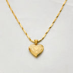 Heart locket and chain detail macro shot