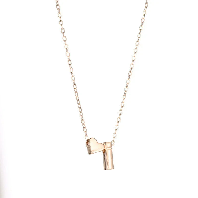 Minimalist initial necklace on fine chain display