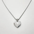 Heart pendant necklace styled with outfit