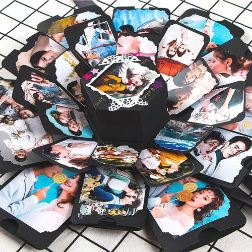 DIY explosion box photo album open with photos and decorations