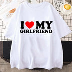 Folded “I Love My Girlfriend” t‑shirt presented flat