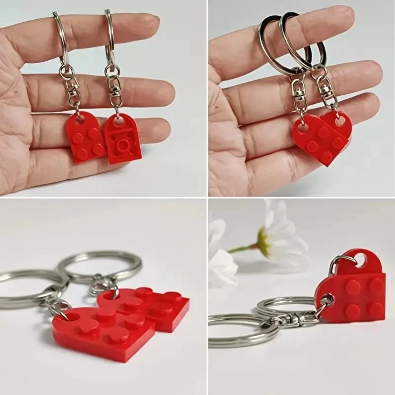 Close‑up of couple heart keychains connected together