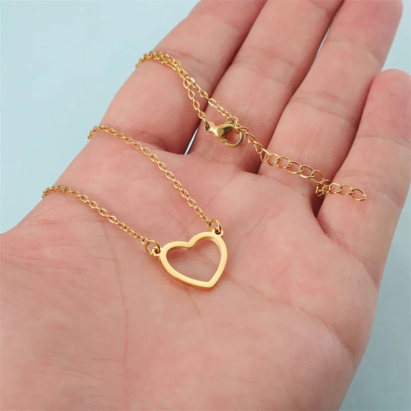 Stylish love heart pendant necklace paired with casual outfit