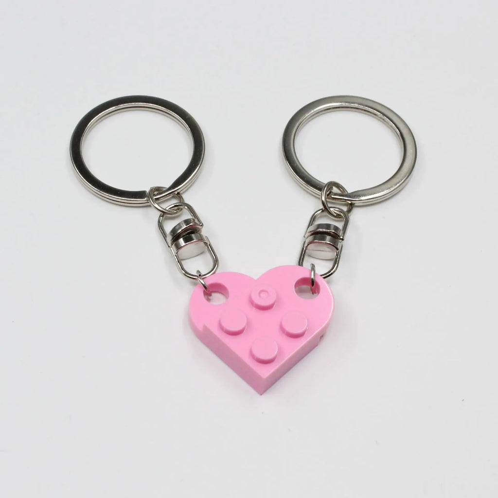 Matching couples keyrings with heart design macro shot