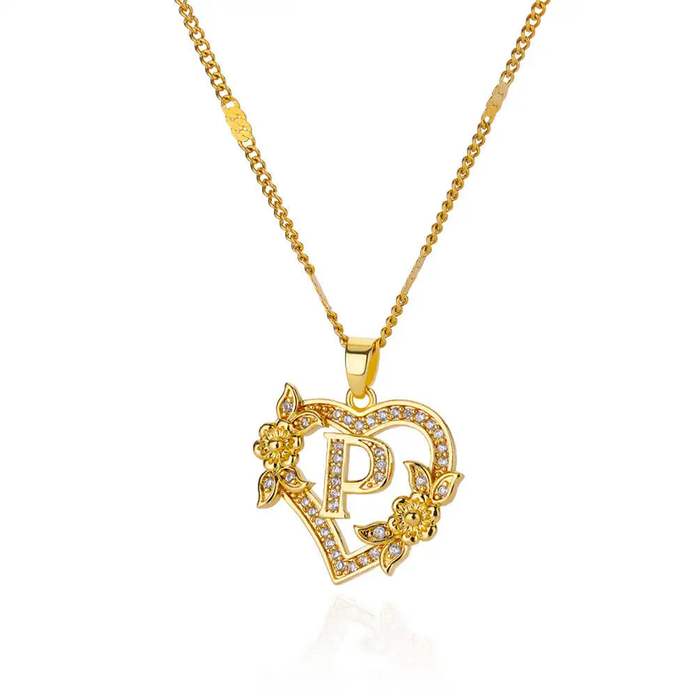 Gold heart initial necklace minimalist composition