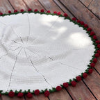Close‑up of rose blanket bouquet texture and yarn flowers