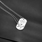 Couple wearing matching puzzle heart Valentine necklaces