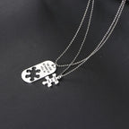 Romantic interlocking heart puzzle necklaces styled flat lay