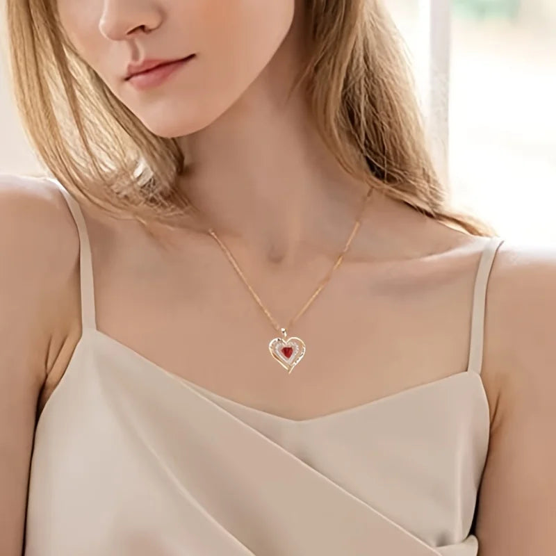 Close-up of sparkling red zircon pendant necklace – romantic anniversary present idea.