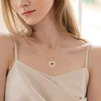 Close-up of sparkling red zircon pendant necklace – romantic anniversary present idea.