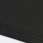 Folded crop top with love text displayed flat