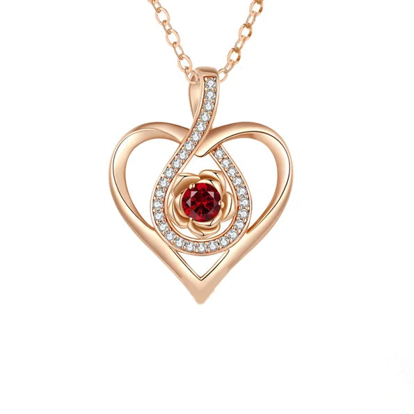 Side angle of rose gift box highlighting sparkling red zircon heart necklace – perfect for her.