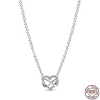 Close‑up of sterling silver heart pendant detail