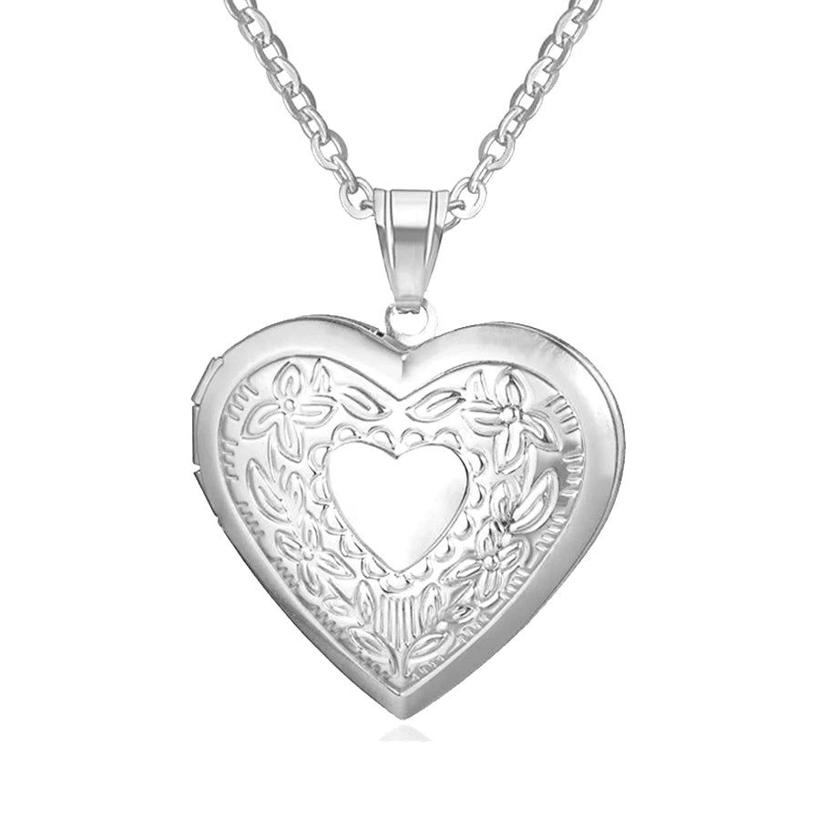 Silver heart locket opening to show interior