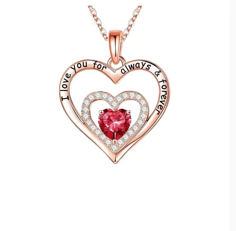 Heart-shaped red zircon pendant necklace in decorative rose box – Valentine’s jewelry gift.