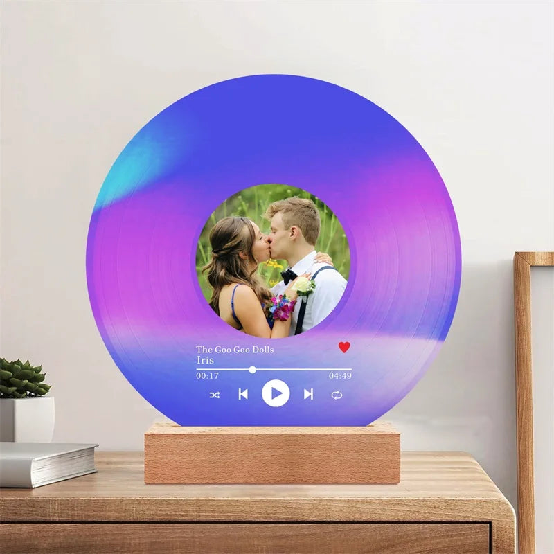 Custom vinyl record plaque mounted above sofa decor