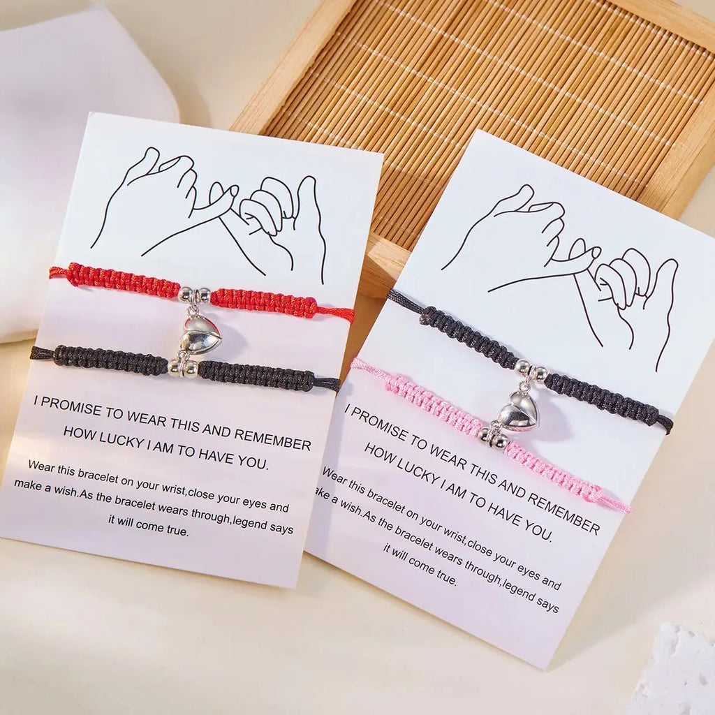 Close-up of magnetic heart connection on couple bracelets