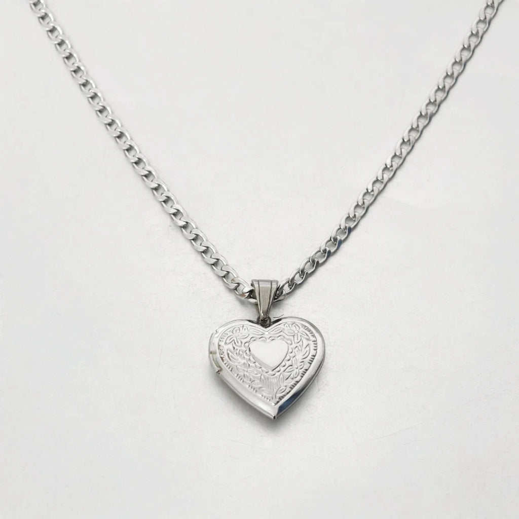 Top view of heart locket and chain arrangement