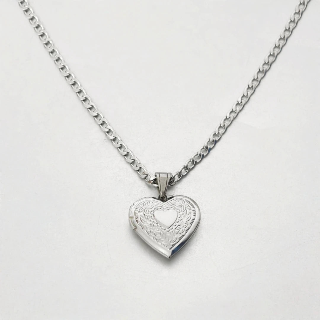 Top view of heart locket and chain arrangement