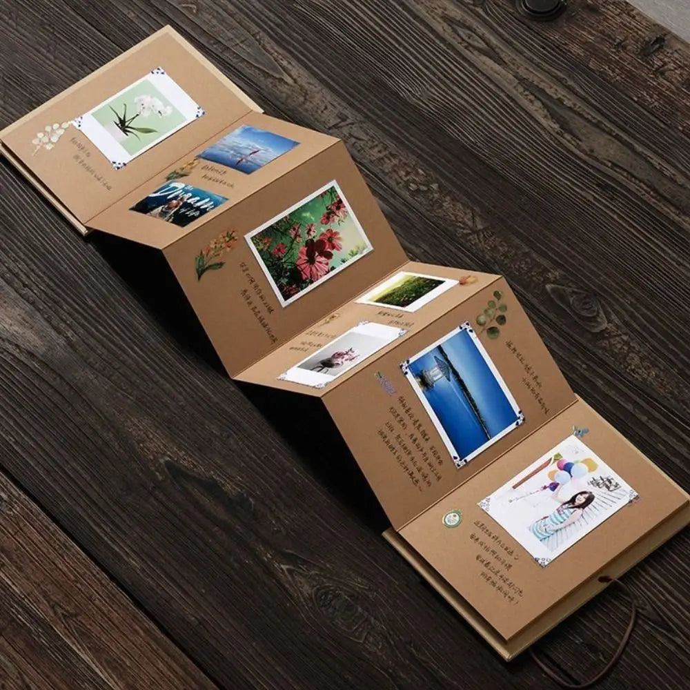 Top-down view of an open photo album, displaying pages ready for creative scrapbooking.