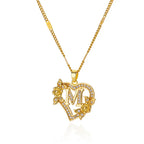 Heart pendant highlighting custom initial engraving